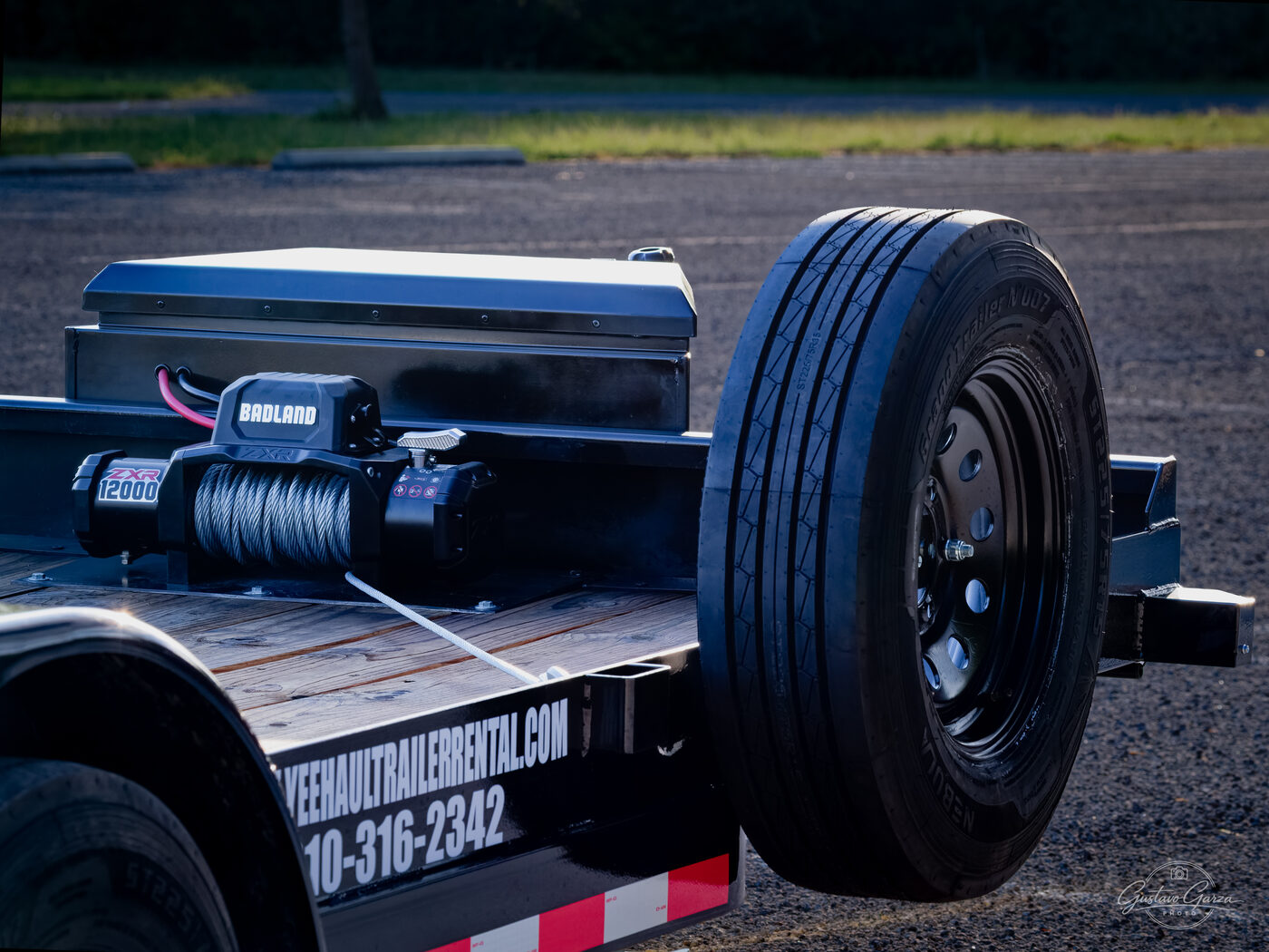 The 12,000 lb winch, aluminum tool box, and spare tire